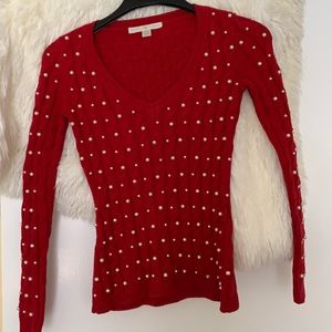 Red pearl embellished cableknit sweater